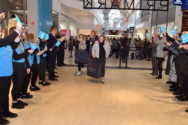 The first Primark customers are greeted by staff on Friday morning. PT50-218.