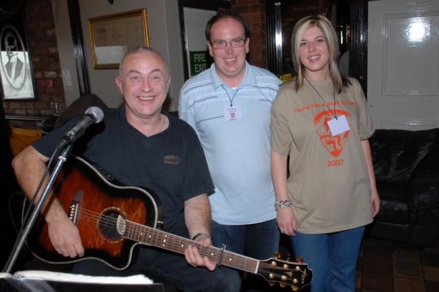 Ludwig O'Neill playing in Dan Campbell's pictured with Stephen Hyslop and Liz Steele of the Chaine Music Festival Committee in 2007.