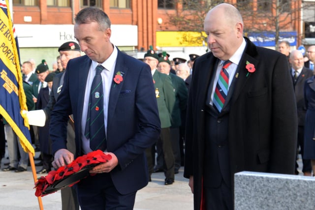 Laying a wreath at the war memorial in Portadown. PT46-225.