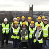 Northern Regional College staff enjoying a view of Anderson Park and the Coleraine skyline from the top of the new campus building. David Lynn, is on far right.