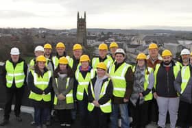 Northern Regional College staff enjoying a view of Anderson Park and the Coleraine skyline from the top of the new campus building. David Lynn, is on far right.