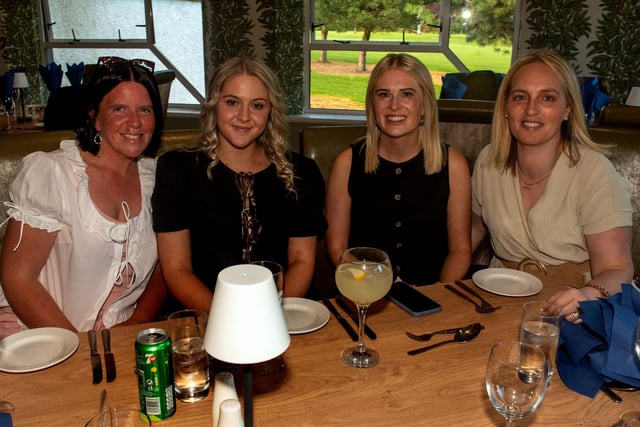 Enjoying the hockey dinner on Saturday evening are from left, Lisa Megaw, Jodie Rainey, Kathryn Allen and Gillian Castles. PT18-301.
