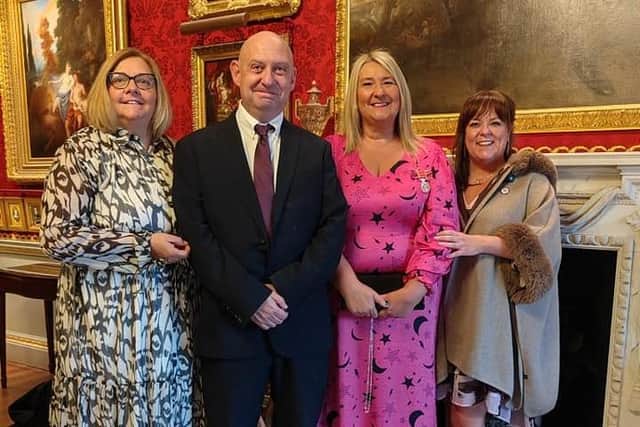 Carrick Connect co-founder Jonny Ewart, chairperson Kerrie McCrory and treasurer Nicola Neill with Tracey at Hillsborough Castle.  Photo: Tracey McNickle