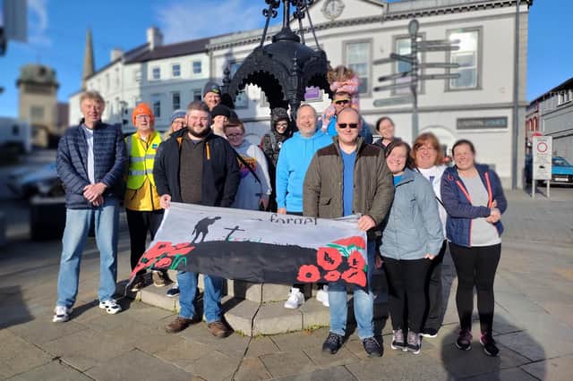The group pictured during the annual walk in memory in Carrickfergus of Alan Hamilton.  Photo: Elaine Parker