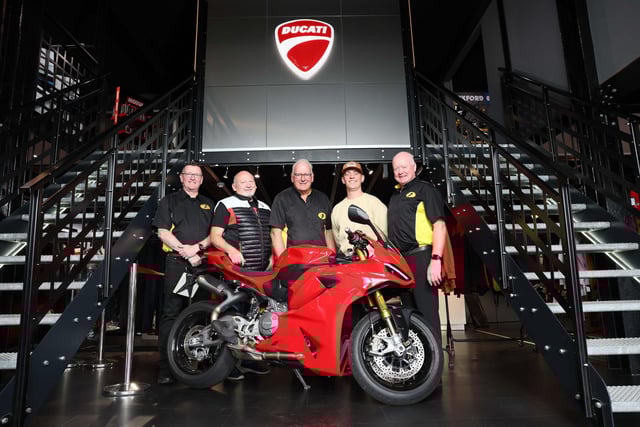 Owner Billy Lyons of Ducati Antrim is pictured with rider Dominic Herbertson and Armoy Road Races Club Chairman, Gareth McAuley, Director Bill Kennedy MBE and Clerk of the Course William Munnis. CREDIT ARMOY ROAD RACES