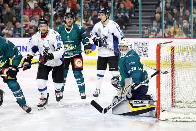 Belfast Giants All Stars’ Petr Cech with Dnipro Kherson’s Kyrylo Bondarenko during Wednesday’s game at the SSE Arena, Belfast in support of Ukrainian Hockey Dream.  All of the proceeds from the game's ticket sales will be donated to the Ukrainian Hockey Dream in support of their continued work to reinstate ice hockey throughout Ukraine.    Photo by William Cherry/Presseye