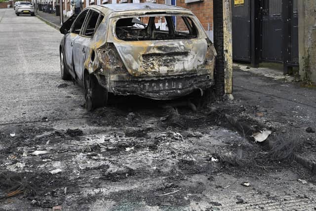 A fire damaged vehicle in Oakley Street, north Belfast: Photo by PressEye.