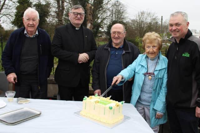 Joining the 100 year celebrations are, from left, Colum Smith, Father Coll, John Devlin, Mary Smith and Oliver Tallon.