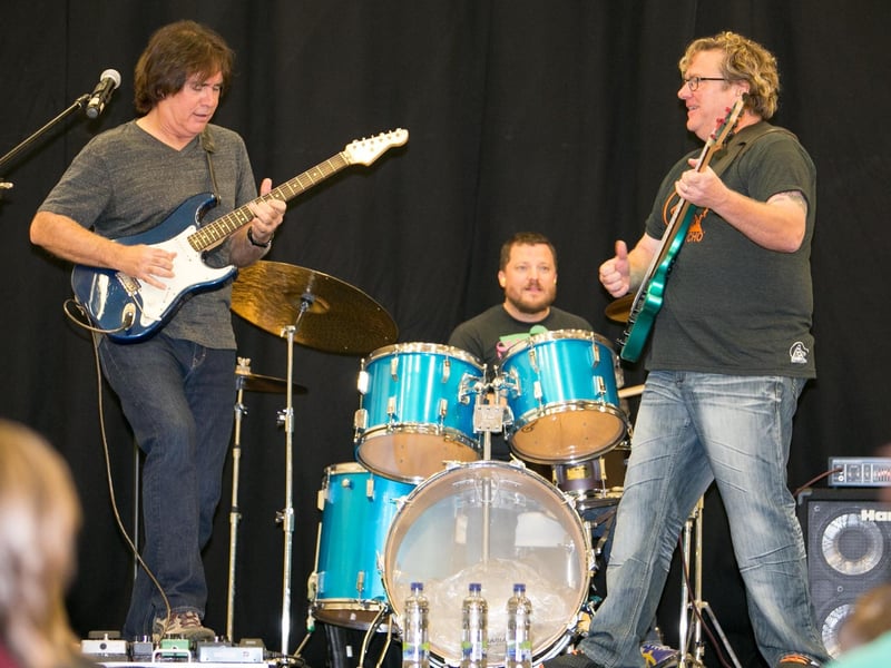 Carl Verheyen jamming with band members. INCT 42-412-RM