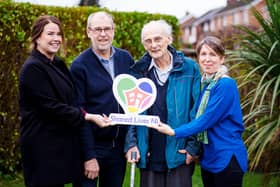 Shared Lives service user Michael and his Shared Lives carer Mark are joined by Alison Milford, Age NI Head of Shared Lives and Pennie Termonia, Northern Trust Social Worker.  Photo: Age NI