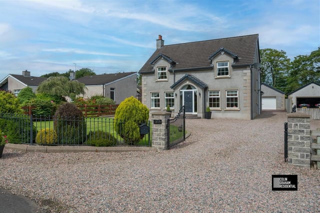The four bedroom home occupies a fully landscaped site.