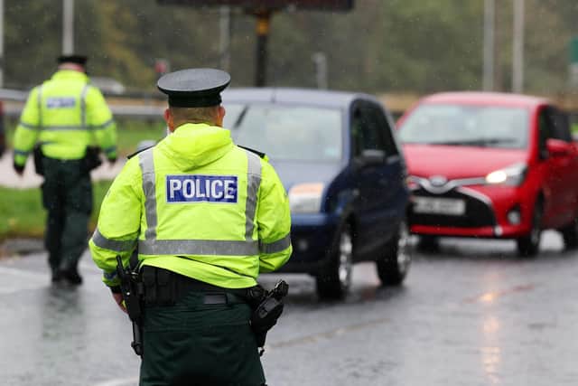 General image of police officers conducting a vehicle checkpoint. Picture: Press Eye