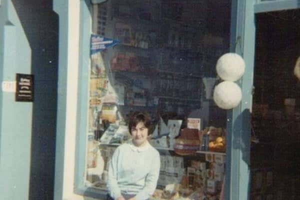 Sheila Conway pictured outside the famous Portstewart sweet shop in 1964