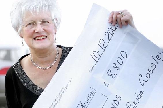 To mark her 70th birthday, Pat decided to take part in a fundraising skydive jumping 13,000ft for MS. She is pictured with the cheque although the final total raised for MS was £9,500