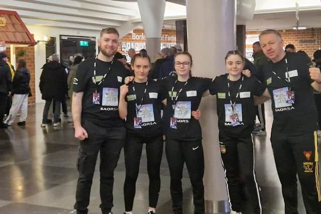 Boxers Skye-Leigh Haighton, Sophie-Leigh McClintock and Lucie Prentice with coaches Iain Mahood Colin Prentice. (Pic: Contributed).