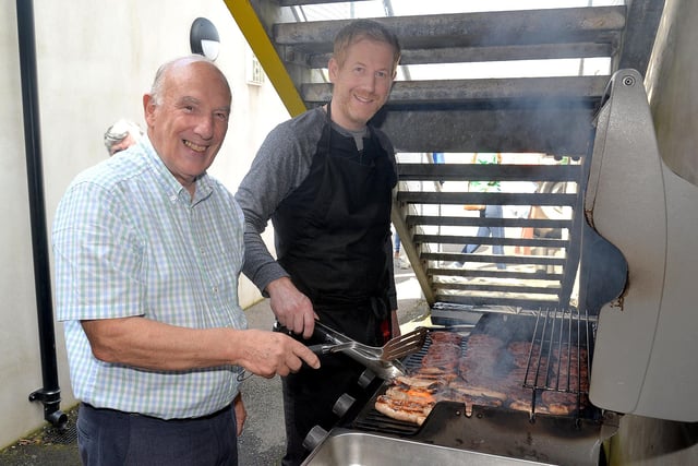 Taking care of the barbeque at the Portadown First Presbyterian Church fun day on Saturday are John Finlay, left, and Andrew Quinn. PT36-222.
