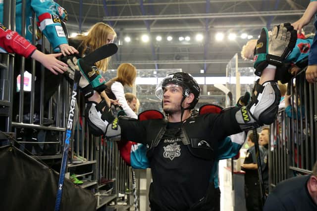 Adam Keefe celebrating with fans at The SSE Arena in 2016. Picture by Darren Kidd / Press Eye