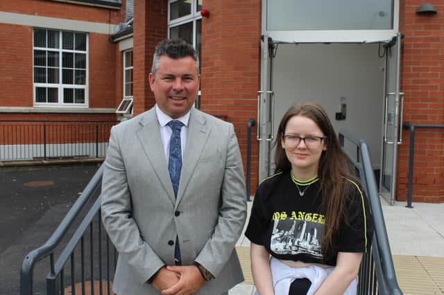 Mark McCullough, principal of Rainey Endowed School pictured with Louise Boone who achieved four A*/A grades: