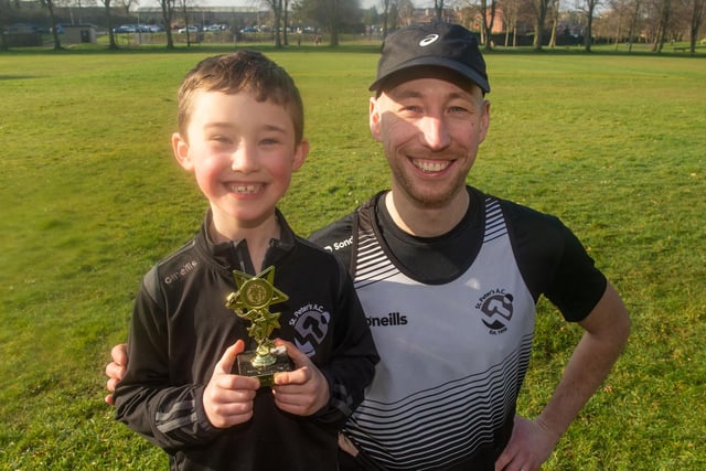 Pictured before the annual Lurgan Park Fun Run is Donogh McLaverty with his son Sheelain (7) who has completed 100 Junior Park Runs. LM10-200.