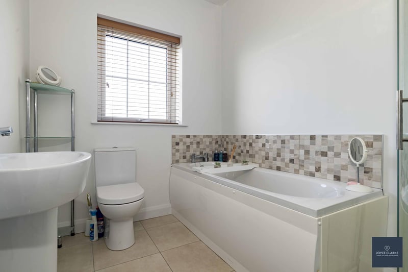 The four piece family bathroom comprises of a panel bath, separate tiled shower quadrant with mains fed shower, dual flush WC and wash hand basin with pedestal. There is tiled flooring and splashback to the bath and wash hand basin. A heated towel rail, recessed lighting and extractor fan finish off this well designed space.