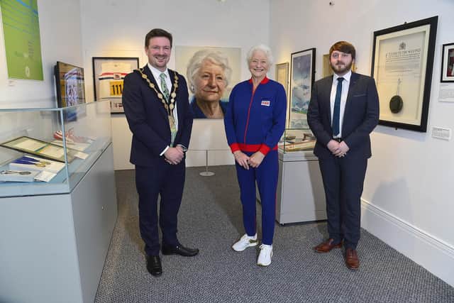 Lady Mary Peters with Lisburn Mayor Councillor Scott Carson and Councillor Aaron McIntyre at the launch of the new exhibition at Lisburn Museum