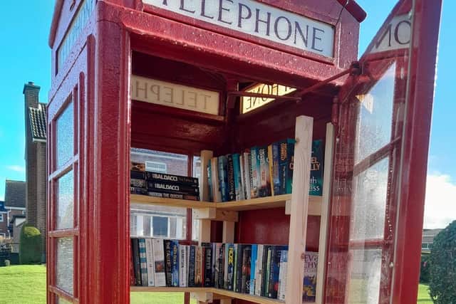 The new telephone box library is open for business at Annahilt crossroads. Pic credit: Annahilt and Magheraconluce Community Association