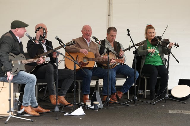 Traditional musicians entertain the crowds at Down Royal on St Patrick's Day.