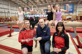 SportMaker Performance Pathway Coach of the Year David Carleton (Left) celebrating with Sport NI’s Simon Toole (Centre), Amanda McMaster from Salto Gymnastics (Right) and gymnasts. Pic credit: McAuley Multimedia