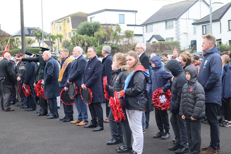 Attending the Remembrance service at Whitehead War Memorial.