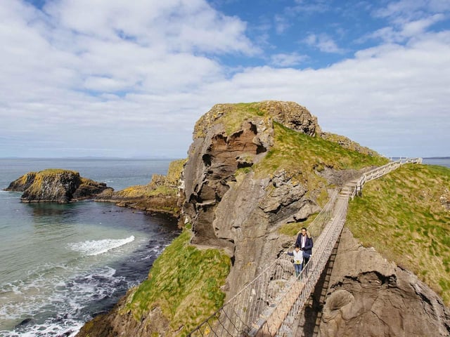 The Carrick-a-Rede Rope Bridge is located near Ballintoy, Co Antrim, spanning over the space of 20 metres.
Walk 30 metres in the air with a view of the rocks down below and pose for some great photos that you can upload later.