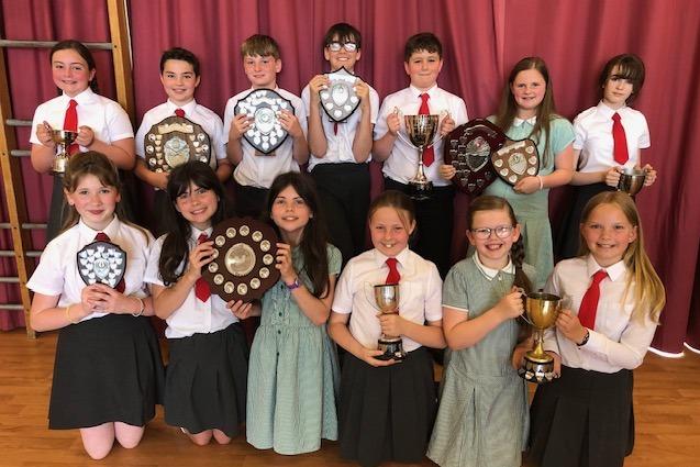 At Donacloney Primary School's Prize Giving Ceremony in June, the P6 and P7 Special Awards went to these talented young people. ﻿Back Row: Rosa Bond, Edmund Hilary, William Waugh, Ashton Kelly, Evan Robinson, Emilie Adamson, Corina Connor. Front Row: Lily Magowan, Scarlett Stevenson, Connie Stevenson, Amelia Fowler, Lily McKinney, Rose Cousins.