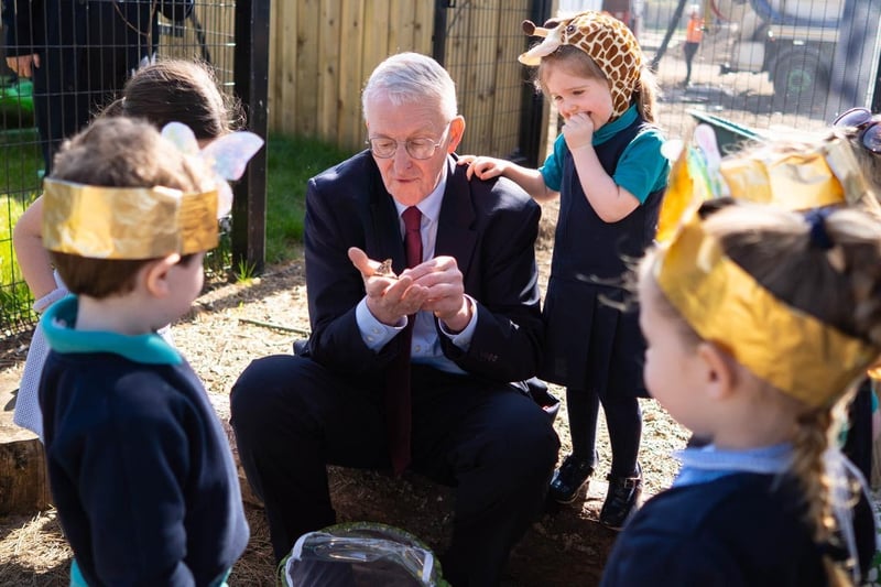 MP Hilary Benn, Secretary of State, with pupils from Mill Strand IPS.