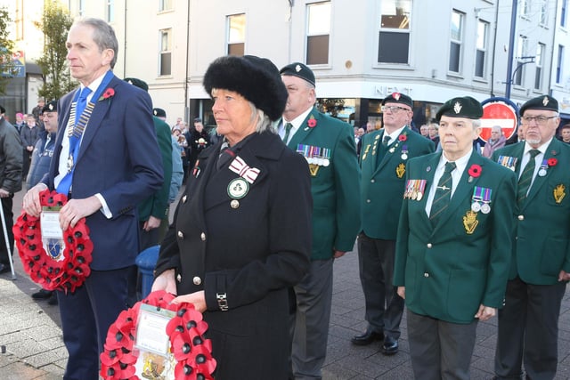 Laying wreaths to mark Armistice Day November 11 at Coleraine War Memorial