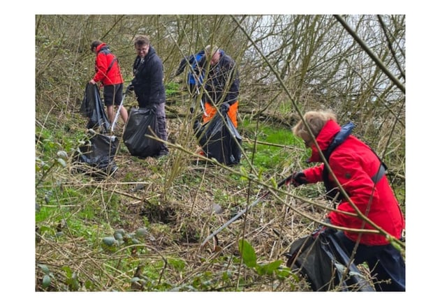 Volunteers busy collecting litter during the clean-up expedition.