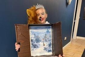 Devon Thompson, P5 at Woodburn Primary School, in a costume inspired by  C.S. Lewis' The Lion, the Witch and the Wardrobe.