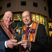 Most Wor. Bro.  Edward Stevenson presents the Grand Master’s Award to Wor. Bro. Perry Reid at the 2024 Orange Community Awards which was held in the Island Arts Centre, Lisburn. Picture: Graham Baalham-Curry.