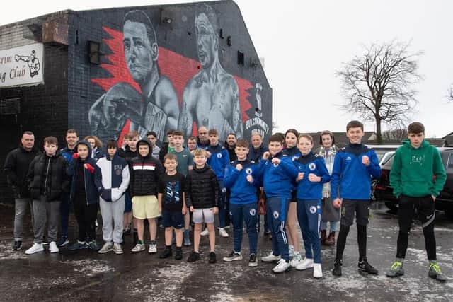 Members of Antrim Boxing Club at the mural by Visual Waste on Durnish Road.