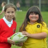 Presentation Primary School and Hart Memorial Primary School pupils learned skills in both rugby and Gaelic football during the joint fun day. PT24-214.