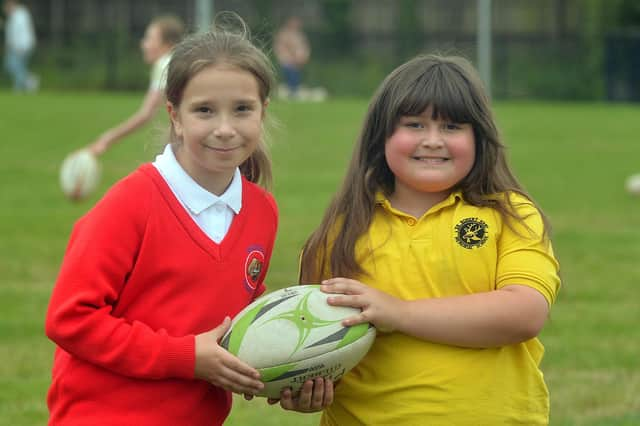 Presentation Primary School and Hart Memorial Primary School pupils learned skills in both rugby and Gaelic football during the joint fun day. PT24-214.