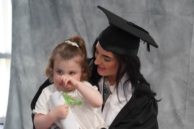 Jessica Brown with her daughter Maisie celebrating her graduation. Pic credit: SEHSCT