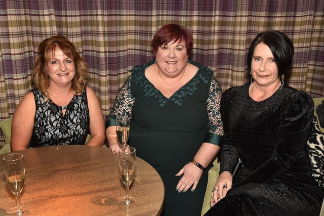 Relaxing at the Business Awards evening are from left, Jackie Halliday, Sonya Taylor and Lesley McFarlane, all from Cairncastle Primary School. LT48-215.