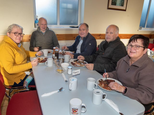 Tucking in to their big breakfast are from left,  Ann and Raymond Bradshaw, Denver Barbour, Mervyn Bradshaw and Wendy Barbour.