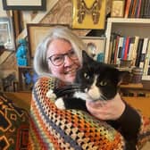 Emma, pictured with her pet cat 'Sox', is sharing her cancer journey to mark Ovarian Cancer Awareness Month. Pic credit: SEHSCT