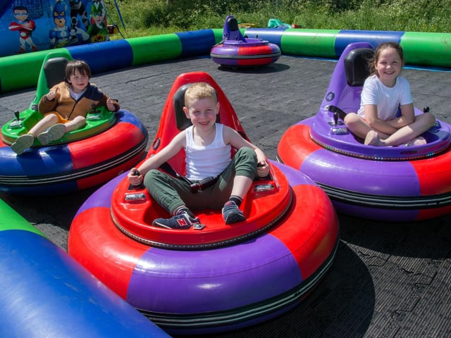 Having a bumper day out at Drumcree Parish Garden Fete are from left, Nathan Melgaard (7), Cooper Dickson (6) and Minnie Melgaard (9). PT23-226.