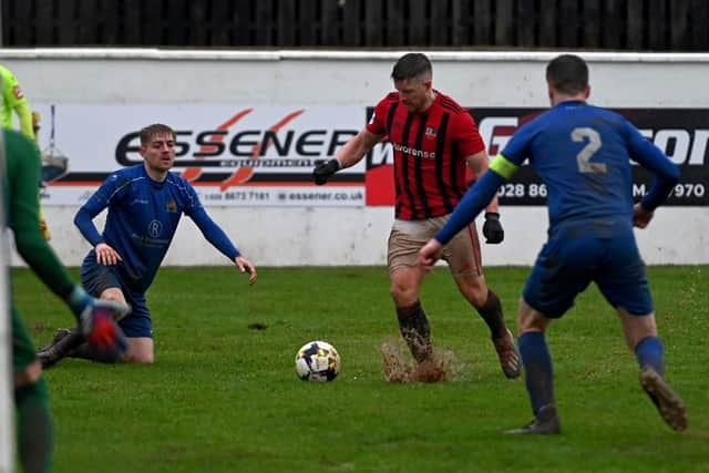 Conor Downey battles through the tricky conditions.