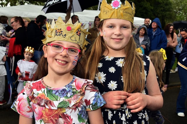 All smiles at the Derryhale Primary School Coronation Party are Emily Keys (8) and Samantha Keys (10). PT18-203.