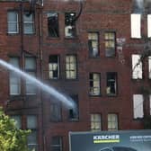 Firefighters attending to a large fire at a building in Samuel Street in Belfast city centre this morning. Photo by Press Eye. Photo: Kelvin Boyes