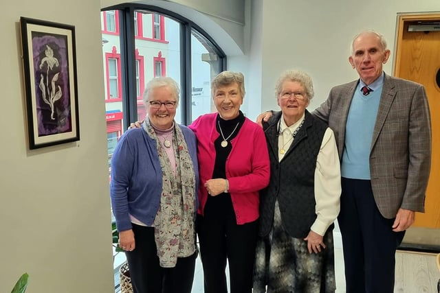 St Mark's Art Club members admire one of the paintings on display at the opening of the club's exhibition in Millennium Court Arts Centre. Included are from left, Olive Cornett, Thelma Irwin, Daphne Hamill and Bob Toner.