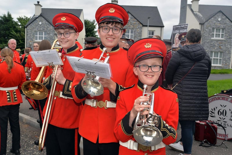 Brothers Lewis, David and Lucas Currie who are members of Poyntzpass Silver Band pictured before the Mavemacullen Accordion Band 70th anniversary parade in Markethill on Wednesday. PT32-229.