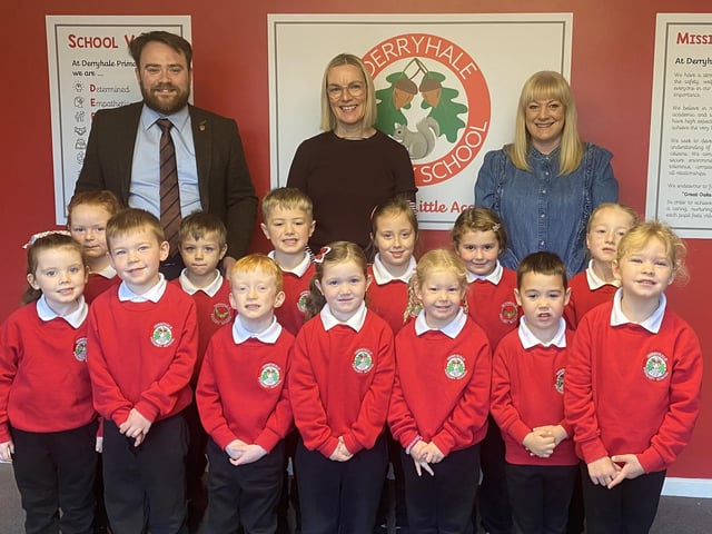 The new P1 class at Derryhale Primary School with Mr Glenny (principal), Mrs McCallen (teacher) and Mrs Vennard (classroom assistant).